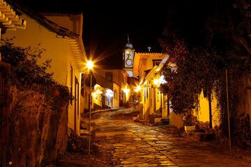 Fototapeta na wymiar Tiradentes, Minas Gerais, night view of the street and church of santo antonio