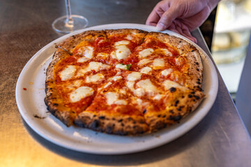 Pizza fresh out of the wood oven