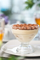 Chocolate brownie with cream, food photography.