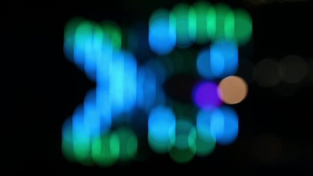 Blurred out of focus dancing lights and bokeh at a light display