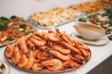 Plate with shrimp on the wedding table