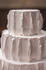 Multilevel wedding cake with marzipan and cream