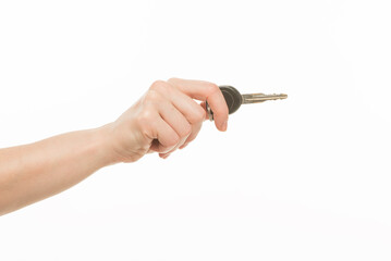 hand with a key on a white background isolated