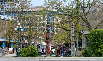Totem Poles at Entrance to Victoria Chinatown