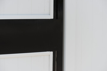 Obraz na płótnie Canvas detail of a black and white gate
