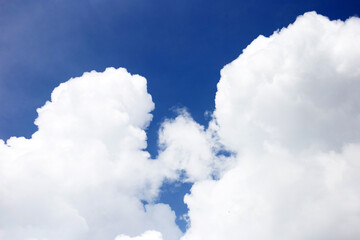 Naklejka na ściany i meble Blue sky background with cloud