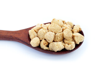 Textured soy protein on white background.