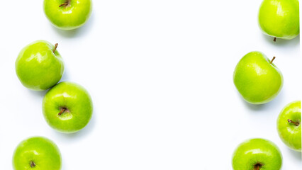 Frame made of green apples on white background. Copy space