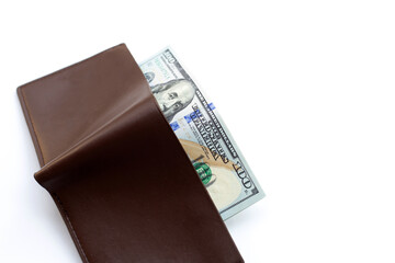 One hundred dollar banknotes in brown wallet. Financial concept