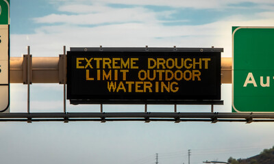 Digital sign warning of a severe drought and to limit outdoor watering