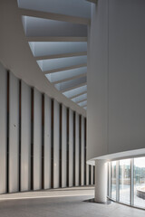 Fototapeta premium Minimal Interior Stairwell with Soft Shadows, Abstract Architecture
