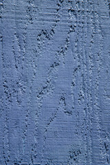close of of blue purple painted wood grain