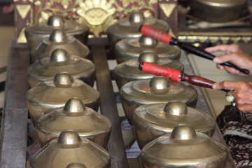 hand of gamelan player, traditional central java, yogyakarta, indonesia musical instrument 

