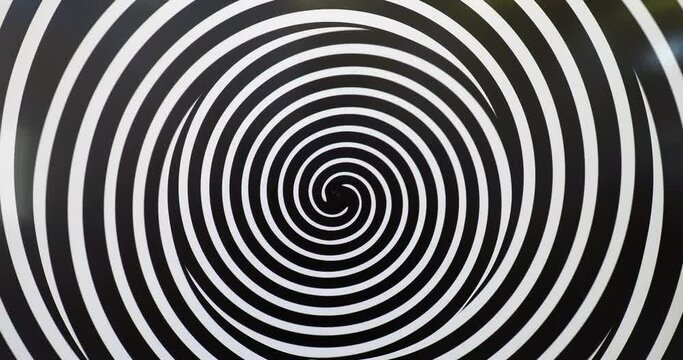 Moving hypnotic spiral, optical illusion