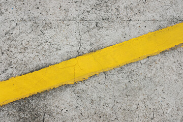 the yellow line on asphalt