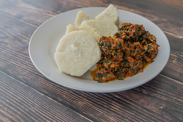 A Plate of boiled yam with spicy Vegetable Stew