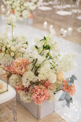 Bright and delicate flowers at the wedding ceremony