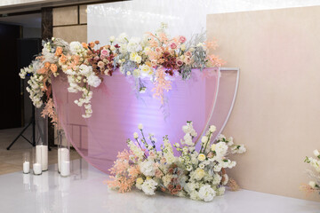 Bright and delicate flowers at the wedding ceremony