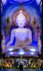 White Pang Mara Wichai Buddha statue, the principal Buddha image in the Wat Rong Sua Ten temple in Chiang Rai. Thailand