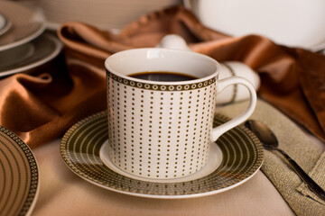 Porcelain coffee set. Modern design of cups and saucers.