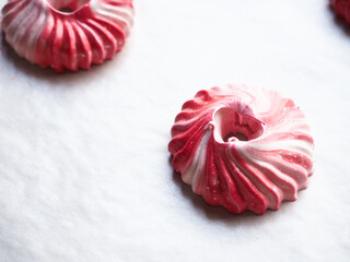Sweet red and white meringue in swirl shape