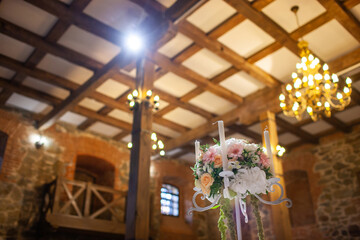 Bouquet of flowers in vase on the wedding table