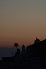 Beautiful sunset and  view of the picturesque chapels on the  island of Ios Greece