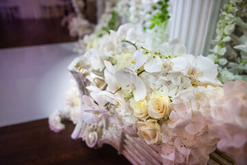 Bouquet of flowers in vase on the wedding table