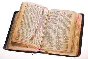 Old antique vintage open bible isolated with cliping path.