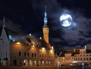  City at Night moon on starry sky  medieval Tallinn old town town hall square at night light reflection  starry night  travel to Estonia