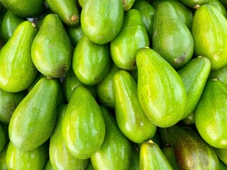 Close-photo of avocado in a fruit market.