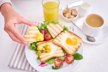 Heart shaped Fried Egg on Toast Bread and cup of fresh hot espresso coffee
