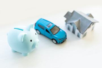 pig piggy bank, toy car, house