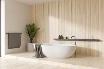 Fototapeta na wymiar Corner view on bright bathroom interior with bathtub