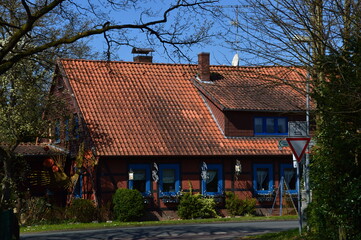 Fototapeta premium Historical Building in Spring in the Village Müden at the River Örtze, Lower Saxony