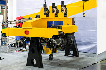 Electric over head crane hoist with trolley frame drive wheel unit for lifting and transfer object and reduce work load on stand