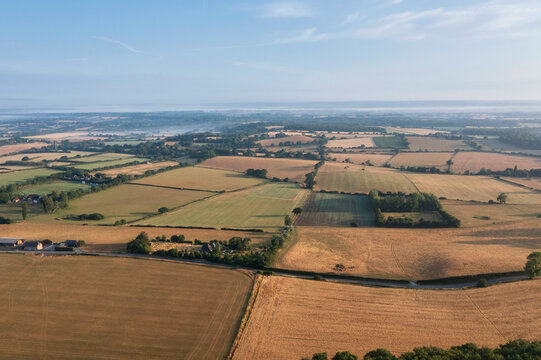 Glorious aerial drone landscape image of South Downs in English countryside on Summer morning