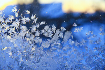 frost patterns on window glass, abstract background winter rime snow