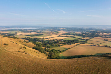 Glorious aerial drone landscape image of South Downs in English countryside on Summer morning