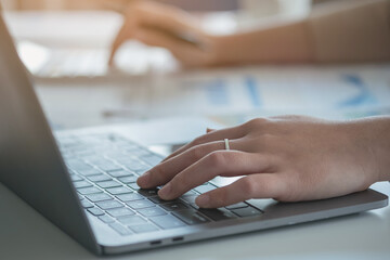 Marketing, Financial, Accounting, Planning, Team of female businessmen and economists use calculators and computers and graph documents to profit the company.