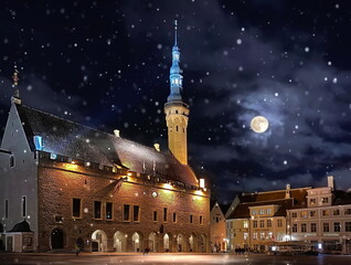winter City at Night moon on starry sky medieval Tallinn old town  hall square fors snow flakes   travel to Estonia