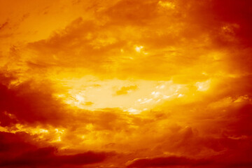  Dark red yellow orange sky with clouds. Gloomy dramatic skies. Background with space for design....
