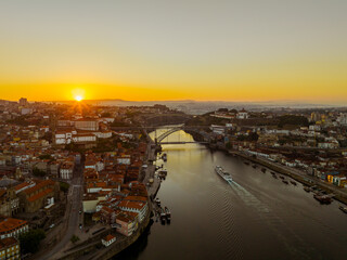 Porto Portugal Aerial View. Dom Luis Bridge at Sunrise. Porto, Portugal. Cityscape of Downtown Touristic Ribeira. Olt Town. Douro River.