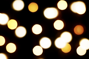 Obraz premium multicolored festive lights on a black background screensaver backdrop