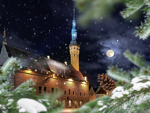 Christmas  Tallinn Old towen sguare green  tree and snowflakes on branch with cones ,Night moon on starry sky  ,medieval  city  , travel to Estonia
