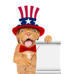 Happy Mastiff puppy wearing like Uncle Sam with sunglasses points on empty list. isolated on white...