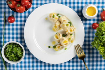 Homemade meat dumplings - pelmeni. Dumplings, filled with meat, ravioli.