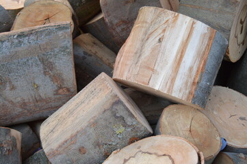Logs of dry wood ready to be chopped into smaller pieces