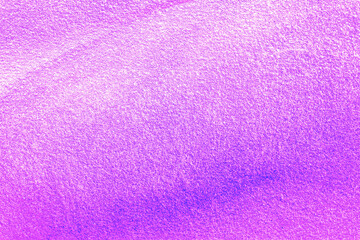 wall graffiti texture of aerosol spray drawing on a city wall , colored abstract wallpaper in urban style