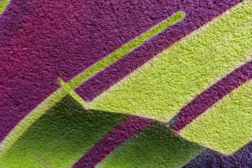 original graffiti, aerosol spray decoration pattern on the city wall, urban modern culrure wallpaper